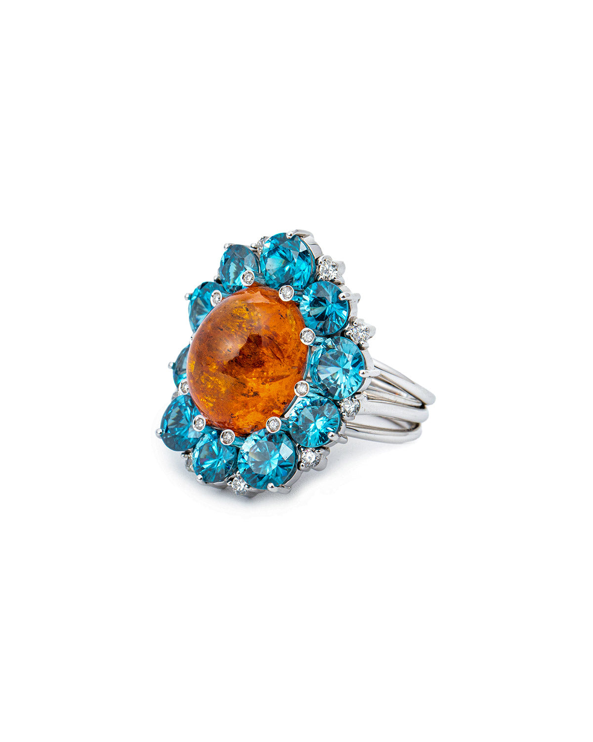 Ballerina Ring with a 23.74 carats Spessartite, Natural Blue Zircons and Diamonds